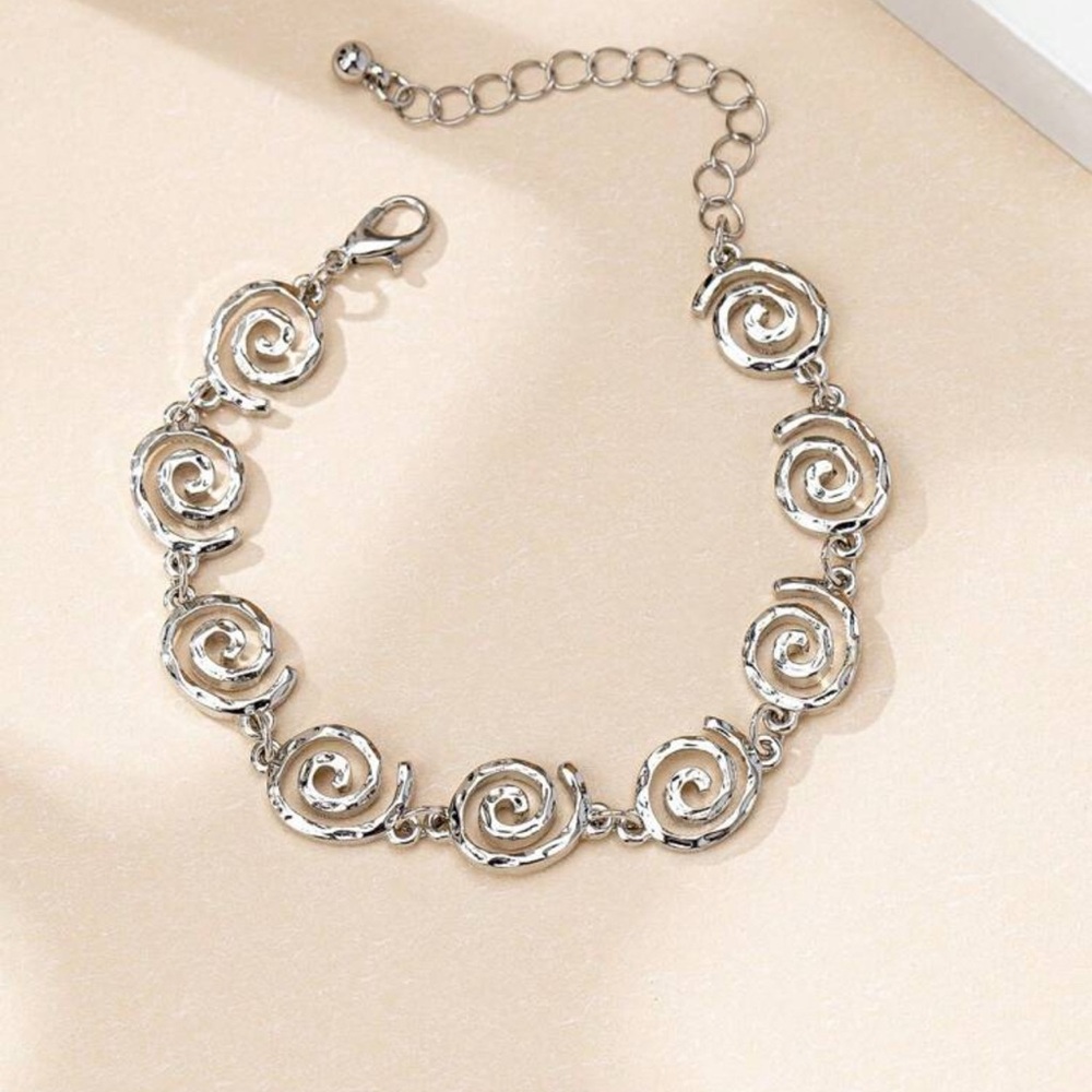 Elegant Silver Swirl Bracelet